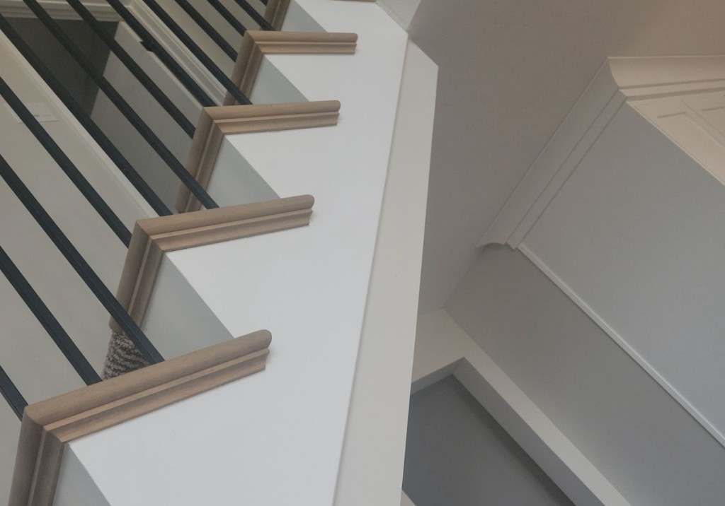 Close-up of a clean accent wall edge with a crisp professional paint line