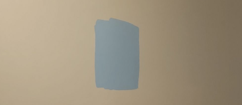 Two-tone kitchen with white perimeter cabinets and a baby blue painted island in a Utah home