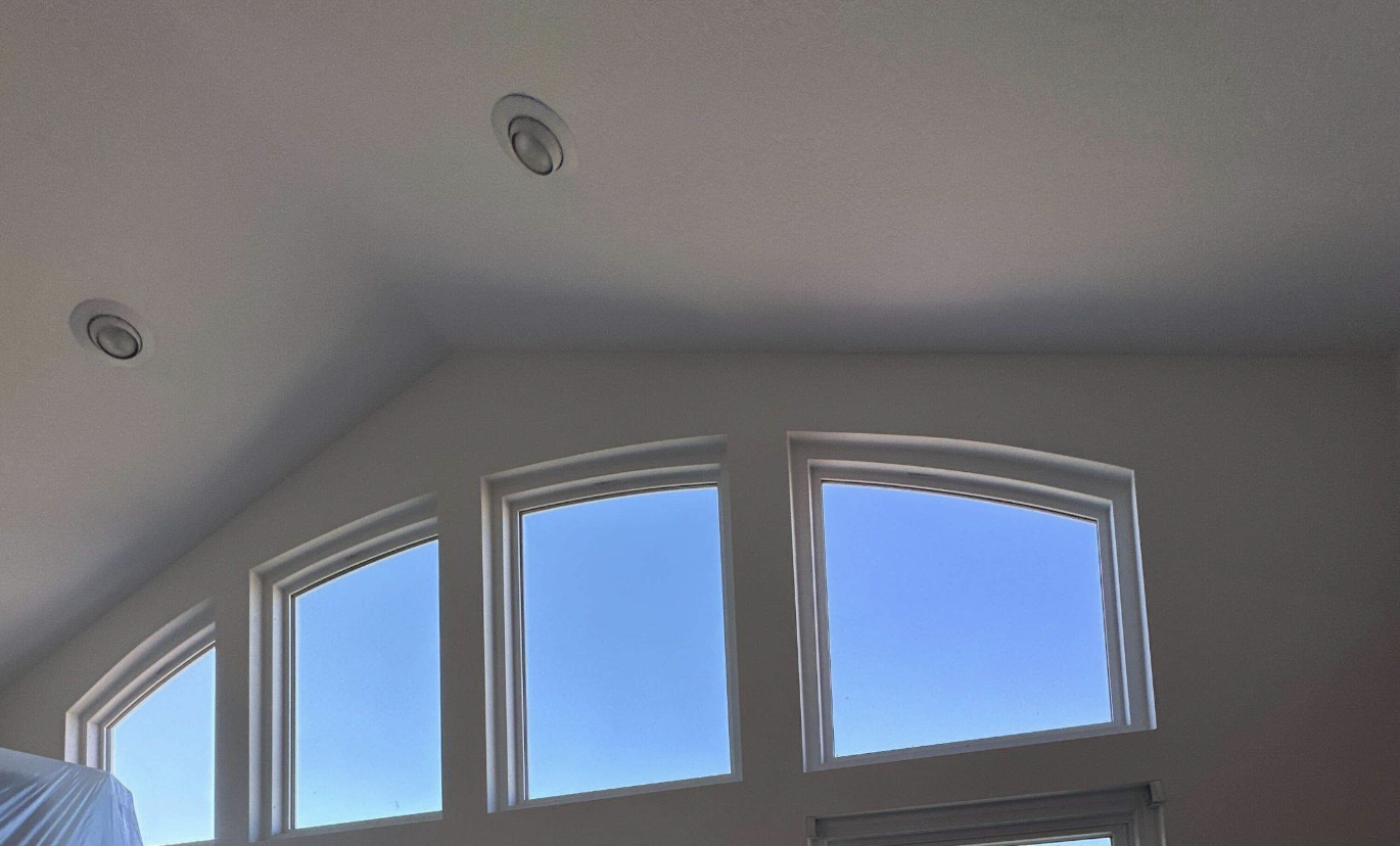 Completed Syracuse interior repaint with vaulted ceiling and fresh wall and ceiling paint